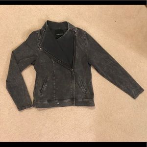 Motor bike style jacket. Very slimming.